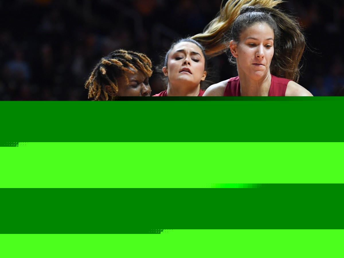 Indiana guard Yarden Garzon (12) and Tennessee forward Jillian Hollingshead (53) fight for the ball during the NCAA womens college basketball game on Monday, November 14, 2022 in Knoxville, Tenn.